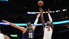 Jokic gets hurt late in 1st half, Heat pull away to top Nuggets