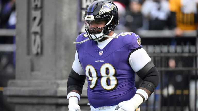 Baltimore Ravens defensive tackle Travis Jones takes to the field before an NFL game against the Pittsburgh Steelers, Sunday, Dec. 7, 2025, in Baltimore. (AP/Nick Wass)