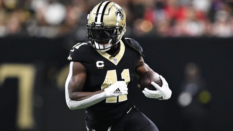 New Orleans Saints running back Alvin Kamara runs with the ball during the first half of an NFL game against the New England Patriots, Sunday, Oct. 12, 2025, in New Orleans. (AP/Ella Hall)