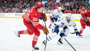 Detroit Red Wings center Nate Danielson (29) shoots against Toronto Maple Leafs defenseman Oliver Ekman-Larsson (95) during the second period of an NHL hockey game Sunday, Dec. 28, 2025, in Detroit. (Ryan Sun/AP)