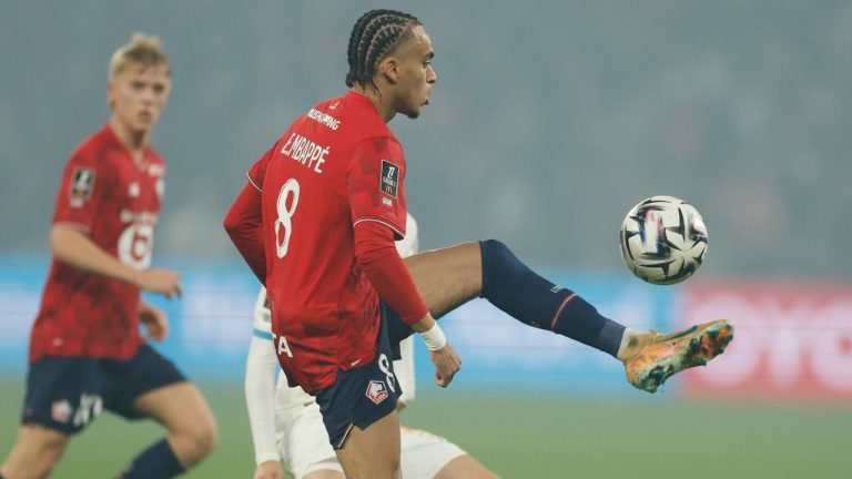 Lille's Ethan Mbappe controls the ball during the French League One soccer match between Lille and Marseille in Villeneuve-d'Ascq, outside Lille, France, Friday, Dec. 5, 2025. (AP/Jean-Francois Badias)