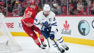 Toronto Maple Leafs centre Auston Matthews, right, moves the puck against Detroit Red Wings centre Nate Danielson, left, during the first period of an NHL hockey game Sunday, Dec. 28, 2025, in Detroit. (Ryan Sun/AP)