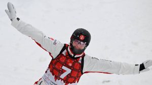 Marion Thenault, of Sherbrooke Que., reacts after landing a jump in the final 12 women finale on Sunday, January 26, 2025 at the FIS freestyle world cup aerials in Lac-Beauport, Quebec. Thenault placed sixth and top Canadian in the final six. (Jacques Boissinot/CP)