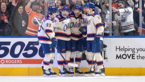 Edmonton Oilers' Ryan Nugent-Hopkins (93), Zach Hyman (18), Connor McDavid (97), Leon Draisaitl (29) and Evan Bouchard (2) celebrate a goal against the Seattle Kraken during first period NHL action, in Edmonton on Thursday, December 4, 2025. (Jason Franson/CP)