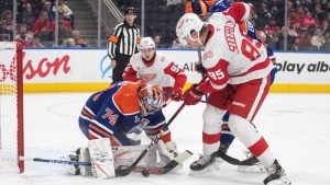 Detroit Red Wings' Elmer Soderblom (85) is stopped by Edmonton Oilers goalie Stuart Skinner (74) during first period NHL action, in Edmonton on Thursday, December 11, 2025. THE CANADIAN PRESS/Jason Franson