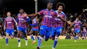 Crystal Palace's Marc Guehi celebrates after scoring his sides second goal during the English Premier League match between Fulham and Crystal Palace, in London, Sunday, Dec. 7, 2025. (John Walton/PA via AP)