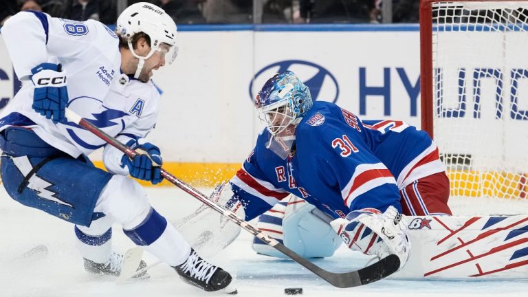Tampa Bay Lightning left wing Brandon Hagel (38) shoots the puck during the second period of an NHL hockey game against New York Rangers, Saturday, Nov. 29, 2025, in New York. (AP Photo/Yuki Iwamura)