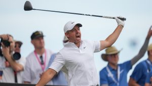 Rory McIlroy of Northern Ireland reacts after his tee shot on the 17th hole during the first round of the Australian Open golf tournament in Melbourne, Australia, Thursday, Dec. 4, 2025. (Asanka Brendon Ratnayake/AP)