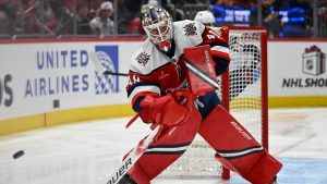 Washington Capitals goaltender Logan Thompson clears the puck during the second period of an NHL hockey game against the Columbus Blue Jackets, Dec. 7, 2025, in Washington. (John McDonnell/AP)