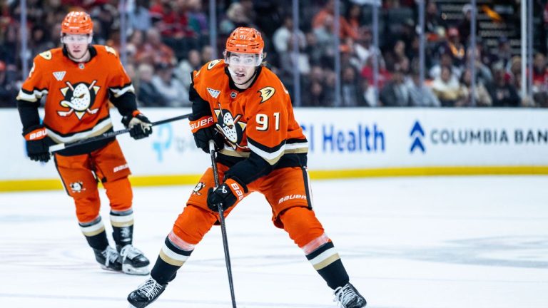 Anaheim Ducks center Leo Carlsson (91) controls the puck against the Chicago Blackhawks during the first period of an NHL hockey game, Dec. 7, 2025, in Anaheim, Calif. (Ethan Swope/ AP)