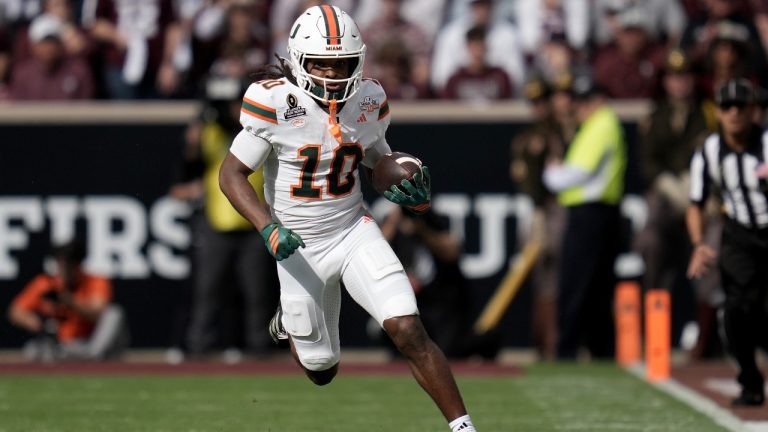 Miami wide receiver Malachi Toney returns a punt against Texas A&M during the second quarter in the first round of the College Football Playoff Saturday, Dec. 20, 2025, in College Station, Texas. (AP/Sam Craft)