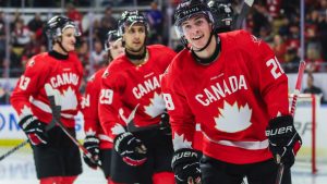 Canada's Brady Martin (28) leads teammates toward the bench following his goal during second period IIHF World Junior Hockey Championship pre-tournament action against Sweden in Kitchener, Ont. on Wednesday, December 17, 2025. THE CANADIAN PRESS/Nick Iwanyshyn