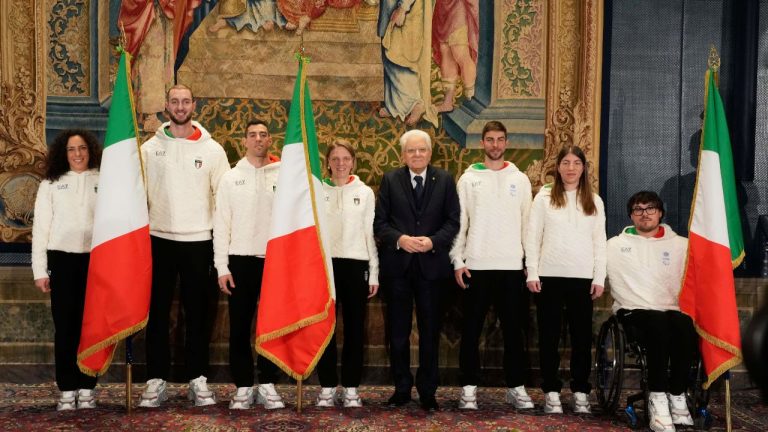 From left, Italian athletes Federica Brignone, Amos Mosaner, Federico Pellegrino, Arianna Fontana, Italian President Sergio Mattarella, Rene' de Silvestro, right, and Chiara Mazzel, second from right, pose for a group photo, during the hand over ceremony of the Italian flag for the Milan-Cortina Winter Olympic games, at the Quirinale Presidential palace, in Rome, Monday, Dec. 22, 2025. (Gregorio Borgia/AP)