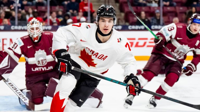 Canada's Michael Misa looks to a play during IIHF World Junior Championship hockey action against Latvia, in Minneapolis on Saturday, Dec. 27, 2025. (Christopher Katsarov/CP)
