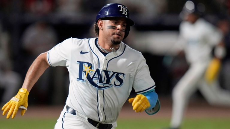 Tampa Bay Rays' Christopher Morel runs the bases after his two-run double off Boston Red Sox pitcher Connelly Early during the first inning of a baseball game, Sept. 21, 2025, in Tampa, Fla. (Chris O'Meara/AP)