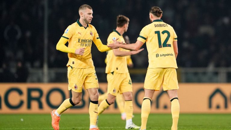 AC Milan's Adrien Rabiot celebrates after scoring his side's first goal during the Serie A soccer match between Torino FC and Milan in Turin, Italy, Monday, Dec. 8, 2025. (Fabio Ferrari/AP)