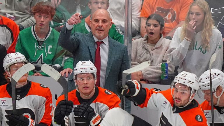 Philadelphia Flyers head coach Rick Tocchet, centre, looks on from the bench during the first period of an NHL hockey game against the Dallas Stars Saturday, Nov. 15, 2025, in Dallas. (LM Otero/AP)