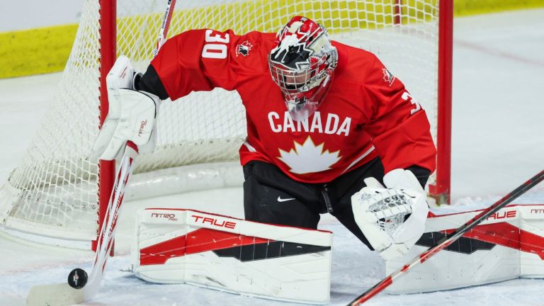 Canada goaltender Carter George makes a save against Sweden during first period IIHF World Junior Hockey Championship pre-tournament action in Kitchener, Ont. on Wednesday, December 17, 2025. (Nick Iwanyshyn/CP)