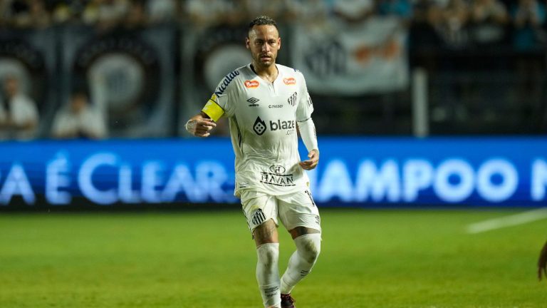 Brazil's Neymar dribbles the ball during his debut for Santos FC in a Sao Paulo league soccer match against Botafogo-SP, in Santos, Brazil, Wednesday, Feb. 5, 2025. (Andre Penner/AP)