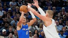 Black scores career-high 38, Magic overcome Nuggets for win