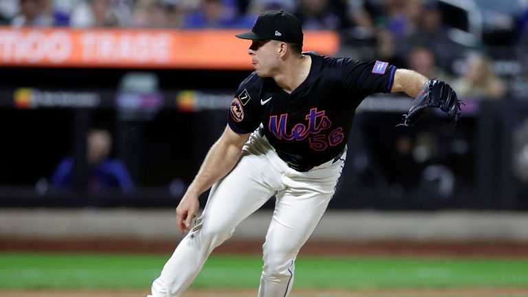 New York Mets pitcher Ryan Helsley throws during the ninth inning of a baseball game against the Texas Rangers, Friday, Sept. 12, 2025, in New York. (Adam Hunger/AP)