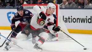Ottawa Senators left winger Brady Tkachuk skates in front of Columbus Blue Jackets defenceman Denton Mateychuk in the second period of an NHL game Thursday, Dec. 11, 2025, in Columbus, Ohio. (AP/Sue Ogrocki)