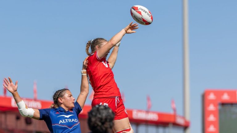 A Canadian player, top, rises high at a lineout in the fifth-place semifinal against France at The Sevens Stadium on Sunday, Nov. 30, 2025, at the Emirates Dubai 7s, the opening event of the HSBC SVNS series. (Alex Ho/World Rugby)