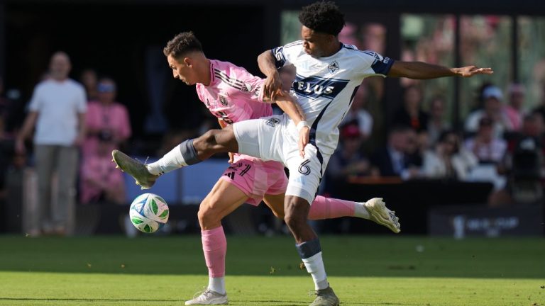 Vancouver Whitecaps midfielder Ralph Priso (6) defends Inter Miami forward Tadeo Allende (21) during the first half of the MLS Cup final match Saturday, Dec. 6, 2025, in Fort Lauderdale, Fla. (AP Photo/Lynne Sladky)