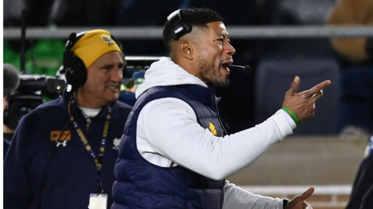 Notre Dame head coach Marcus Freeman yells to his players during the fourth quarter of an NCAA football game against Syracuse, Saturday, Nov. 22, 2025, in South Bend, Ind. (AP Photo/Paul Beaty)