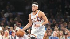 Suns guard Devin Booker to miss at least a week with sprained ankle