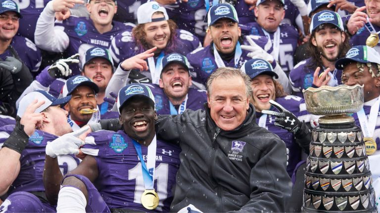Western Mustangs head coach Greg Marshall celebrates with his team after defeating the Queen’s Golden Gaels to win the OUA Yates Cup in university football action at Western University in London, Ont. on Saturday, November 12, 2022. (Geoff Robins/THE CANADIAN PRESS)