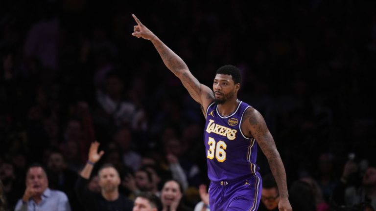 Los Angeles Lakers guard Marcus Smart (36) celebrates his three-point basket during the second half of an NBA Cup basketball game against the San Antonio Spurs Wednesday, Dec. 10, 2025, in Los Angeles. (Jae C. Hong/AP)