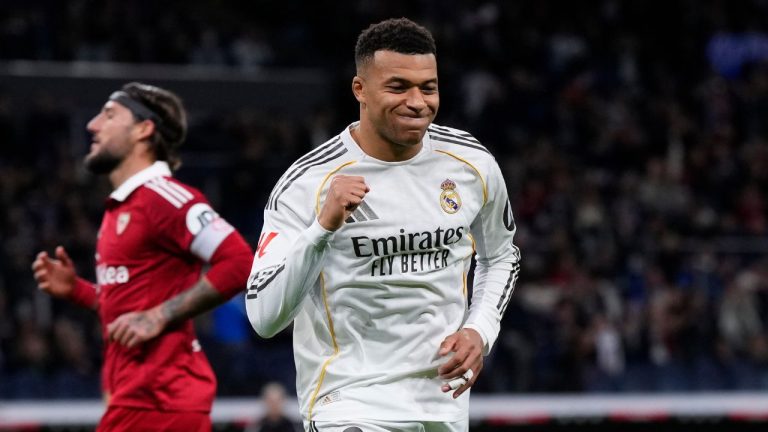 Real Madrid's Kylian Mbappe after scoring his sides second goal from the penalty spot during the Spanish La Liga soccer match between Real Madrid and Sevilla in Madrid, Spain, Saturday, Dec. 20, 2025. (AP Photo/Manu Fernandez)