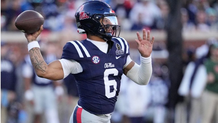 Mississippi quarterback Trinidad Chambliss passes against Tulane during the first half of an NCAA College Football Playoff, Saturday, Dec. 20, 2025, in Oxford, Miss. (AP Photo/Rogelio V. Solis)