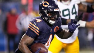 Chicago Bears' D'Andre Swift runs during the first half of an NFL football game against the Green Bay Packers Saturday, Dec. 20, 2025, in Chicago. (AP Photo/Nam Huh)