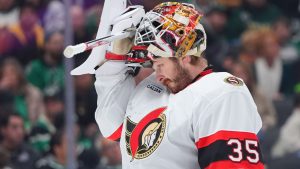 Ottawa Senators goaltender Linus Ullmark takes a break during the first period of an NHL game against the Dallas Stars, Sunday, Nov. 30, 2025, in Dallas. (AP Photo/LM Otero)