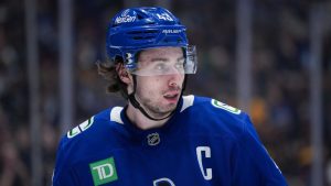 Vancouver Canucks' Quinn Hughes waits for a faceoff during the second period of an NHL hockey game against the Vegas Golden Knights, in Vancouver, on Wednesday, April 16, 2025. (Darryl Dyck/CP)