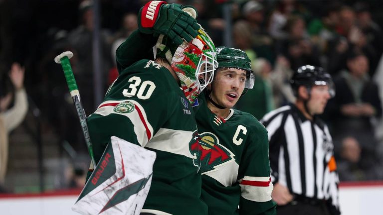 Minnesota Wild goaltender Jesper Wallstedt, left, and defenceman Jared Spurgeon. (Matt Krohn/AP)