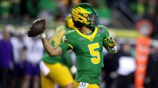 Defence carries day for Oregon, as Ducks top Texas Tech in CFP quarters