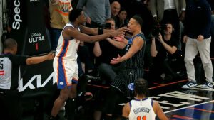 New York Knicks forward OG Anunoby, left, and Orlando Magic guard Desmond Bane, right, get into an altercation during the second half of an NBA basketball game Sunday, Dec. 7, 2025, in New York. (John Munson/AP)