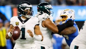 Philadelphia Eagles quarterback Jalen Hurts (1) prepares to throw a pass during the first half of an NFL football game against the Los Angeles Chargers, Monday, Dec. 8, 2025, in Inglewood, Calif. (Caroline Brehman/AP)