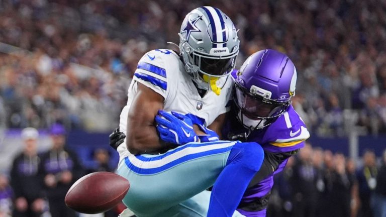 Minnesota Vikings cornerback Byron Murphy Jr., right, breaks up a pass intended for Dallas Cowboys wide receiver George Pickens during the first half of an NFL football game Sunday, Dec. 14, 2025, in Arlington, Texas. (Julio Cortez/AP)