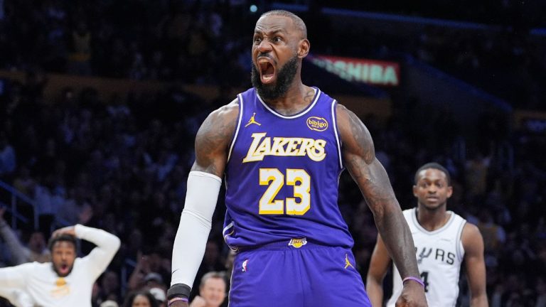 Los Angeles Lakers forward LeBron James (23) reacts after making a dunk during the first half of an NBA Cup basketball game against the San Antonio Spurs Wednesday, Dec. 10, 2025, in Los Angeles. (Jae C. Hong/AP)