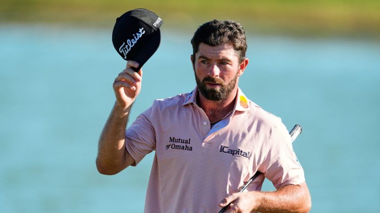 Cameron Young, of the United States, greets to the crowd after the second round of the Hero World Challenge PGA Tour at the Albany Golf Club, in New Providence, Bahamas, Friday, Dec. 5, 2025. (Fernando Llano/AP)