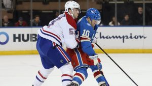 Montréal Canadiens' Noah Dobson (53) is called for a penalty on New York Rangers' Artemi Panarin (10) in the first period of an NHL hockey game, Saturday, Dec. 13, 2025, in New York. (Heather Khalifa/AP Photo)