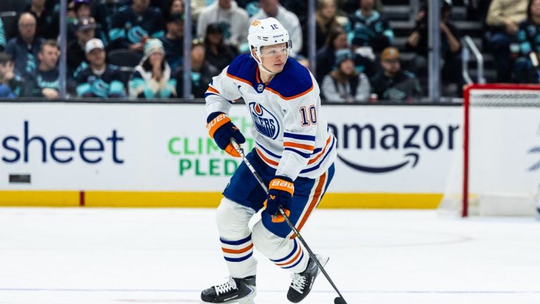 Edmonton Oilers centre Trent Frederic skates with the puck during the first period of an NHL hockey game against the Seattle Kraken, Saturday, Nov. 29, 2025, in Seattle. (Maddy Grassy/AP)