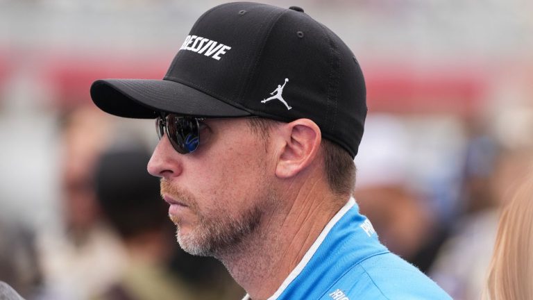Denny Hamlin looks on prior to a NASCAR Cup Series auto race at Charlotte Motor Speedway, Sunday, Oct. 5, 2025, in Concord, N.C. (Matt Kelley/AP Photo)