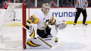 Pittsburgh Penguins goaltender Tristan Jarry (35) reacts during the second period of an NHL hockey game against the New Jersey Devils Saturday, Dec. 21, 2024, in Newark, N.J. (Adam Hunger/AP)