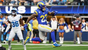 Los Angeles Rams running back Kyren Williams (23) scores a rushing touchdown during the first half of an NFL football game against the Detroit Lions, Sunday, Dec. 14, 2025, in Inglewood, Calif. (Caroline Brehman/AP)
