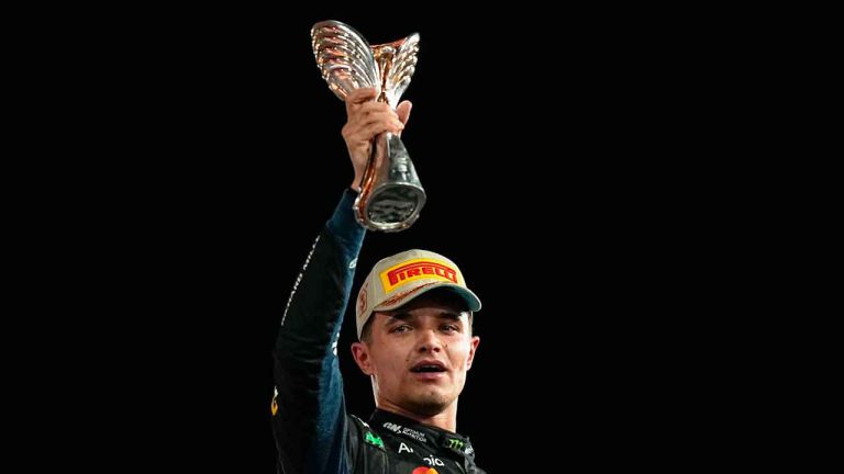 McLaren driver Lando Norris of Britain celebrates after becoming a world champion after the Formula One Abu Dhabi Grand Prix at the Yas Marina Circuit in Abu Dhabi. (Fatima Shbair/AP)